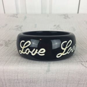 Black with white plastic Love bangle